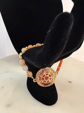 Gold-Tone Filigree Bracelet Peach Beads, (confidence, strength, and loyalty)
